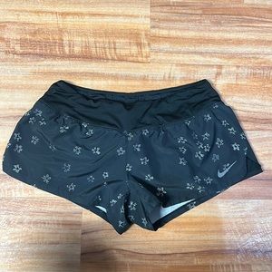Black with details athletic shorts. Built in underwear with a drawstring.
